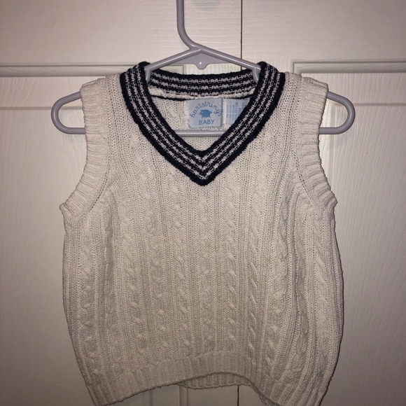 White Vest with blue detail at collar line. - Picture 2 of 6